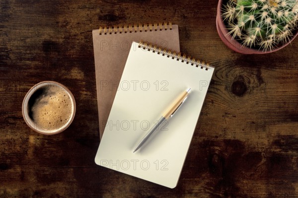 Notebook with a pen, coffee, and plant, overhead flat lay shot on a rustic wooden desk, a mockup, Food photography, Food photography