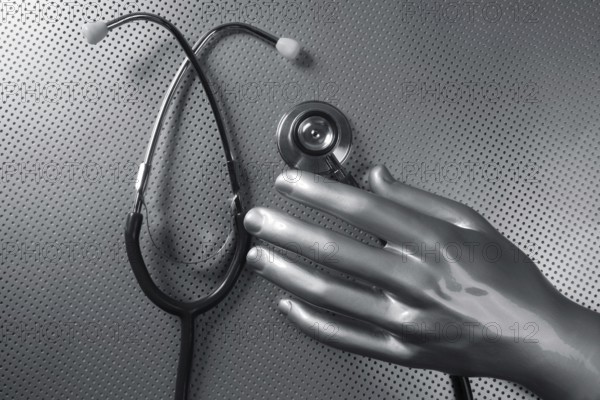 Health stethoscope futuristic silver gray hand concept metaphor