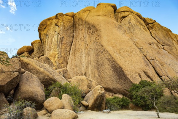 Spitzkoppe is a small picturesque rock massif in Namibia. Africa. Namibia. Huge rounded boulders in the middle of the vast Namibian desert