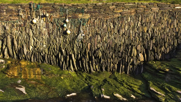 Trebarwith Strand is just over two miles from Tintagel along the north Cornwall heritage coastline landmarked by Gull Rock. The sandy beach becomes completely covered at high tide.