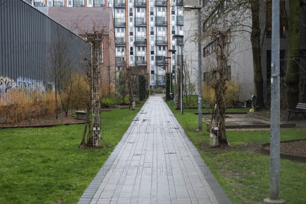 Leuven, Flemish Brabant Region, Belgium, April 1, 2023, Garden and inner court of a social housing block, Europe