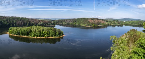 Lake and island with trees. Water reservoir Sec, Czech Republic, Europe