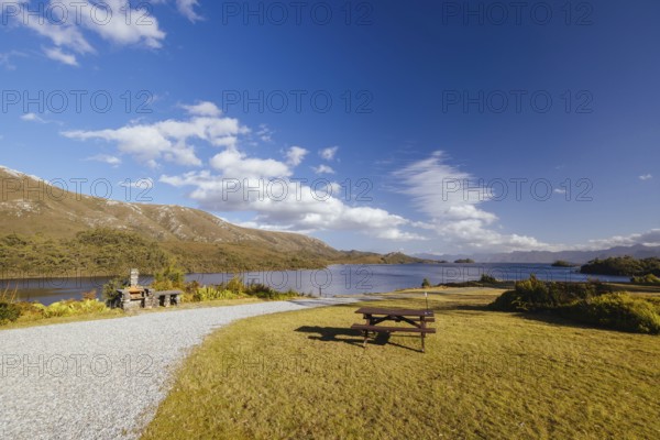 The picturesque landscape from Lake Pedder Wilderness Lodge over Lake Pedder on a hot summer's afternoon in Southwest National Park, Tasmania, Australia, Oceania