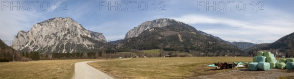 Lamingtal cycle path between farmland in spring, Pribitz mountain and Meßnerin mountain, in the valley Tragöß Oberort, Hochschwab region, panoramic view, near Tragöß, Styria, Austria, Europe