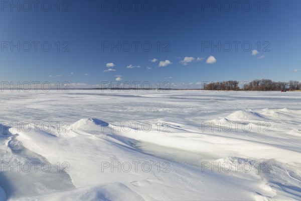 Nature, frozen riverscape with snow drifts, Province of Quebec, Canada, North America