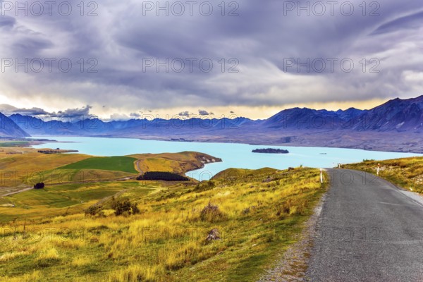 New Zealand, South Island. Lake Tekapo on cloudy day. The lake in the mountains. Travel to a faraway country. The concept of active, exotic and photo tourism, Oceania