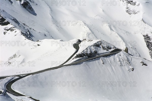 The famous Grossglockner mountain road leads throug snow-covered mountains. Hohe Tauern National Park. Great spring trip to Austria. Snow in May
