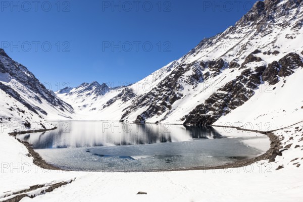Ski in chile on a sunny day with lots of snow. South America
