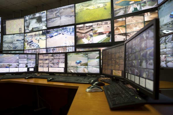 The control room of the city surveillance center. Computer monitors showing the cameras all over the city
