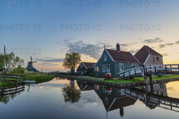 Amsterdam Netherlands, Sunrise landscape of Dutch Windmill and traditional house at Zaanse Schans Village