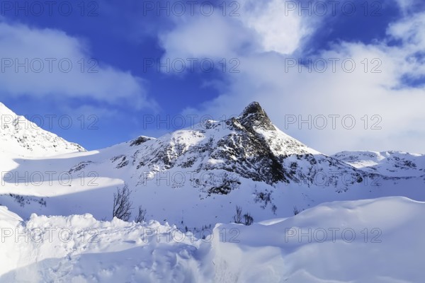 Beautiful winter landscape scene, sunset or sunrise in mountains and fjords