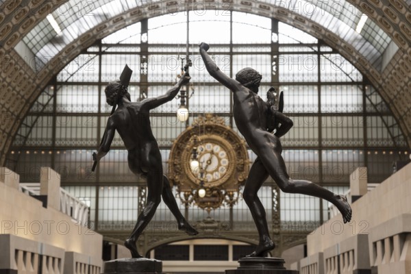 PARIS, FRANCE, MAY 29, 2022, Ornate clock at the main hall of famous museum d'Orsay in Paris, France, Europe
