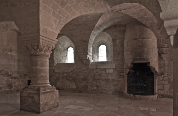 Cistercian monastery founded in 1148, cloister, calefactorium, warming room and brothers' hall also used as scriptorium, fireplace on the right
