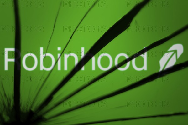 Dhaka, Bangladesh- 09 Nov 2024: Robinhood logo is visible on the broken glass