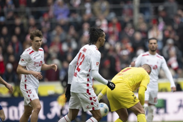 (DFL/DFB REGULATES PROHIBIT ANY USE OF PHOTOGRAPHS AS IMAGE SEQUENCES AND/OR QUASI-VIDEO), RheinEnergieStadion, Cologne, North Rhine-Westphalia, Damion Downs (1.FC Köln, Forward, #42), Marvin Schwäbe (1.FC Köln, Goalkeeper, #1), 2nd Bundesliga, 1.FC Köln, Hamburger SV on 09/02/2025 at RheinEnergieStadion in Cologne Germany