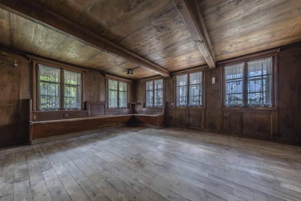 The living room with wooden corner bench in a house built around 1750 that has since been demolished. Menznau, Lucerne, Switzerland, Europe