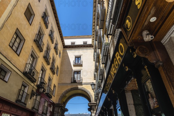 Madrid, Spain, June 1, 2019: Toledo Street near Plaza Mayor. Low angle view of old buildings, Europe