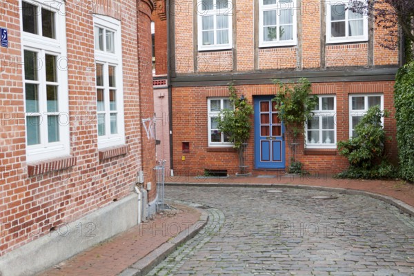 Narrow alley, Stade, Lower Saxony, Germany, Europe