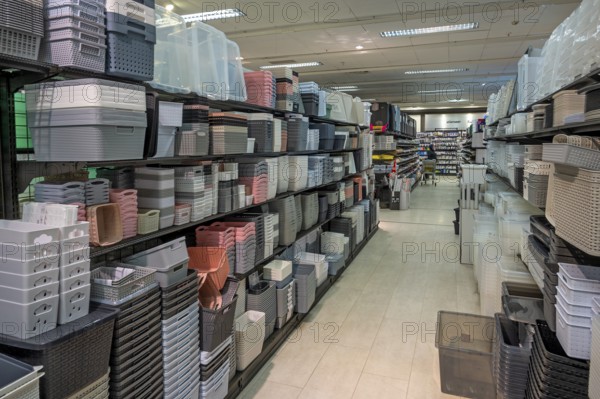 Shelves with plastic baskets, one-euro shop, Allgäu, Bavaria, Germany, Europe