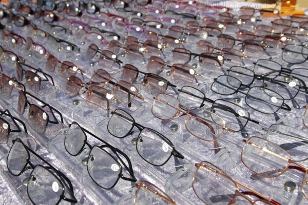 Glasses for close up view in rows many eye glasses shop