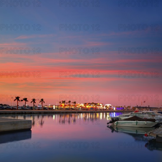 Denia port sunset dusk in marina at Alicante Spain