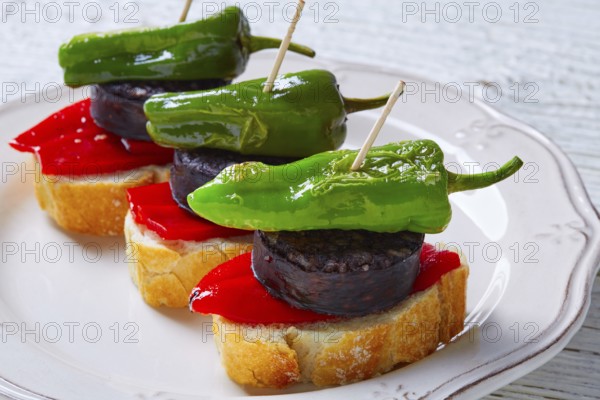 Pinchos Burgos morcilla with padron pepper tapas pintxos from Spain food