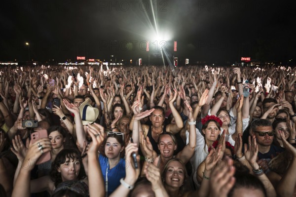 WROCLAW, POLAND - AUGUST 12, 2023: Festival Meskie Granie (Man's playing) play of audience in front of the stage