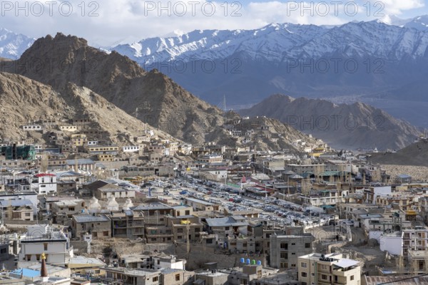 LEh, India, April 02, 2023: The polo ground, which is used as parking lot, in the historic city centre, Asia