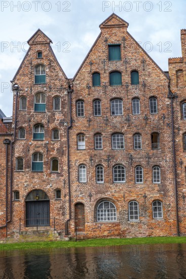Historic buildings in Lübeck Warehouses at the harbour are a popular and famous sight made of red brick, Historic buildings in Lübeck at the harbour, famous and old with red brickstones