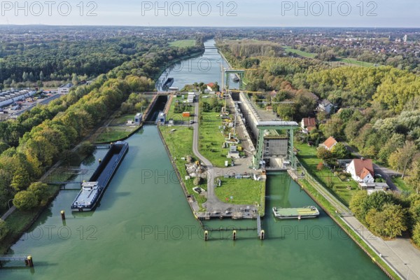 Repair Works at a canal lock in North Rhine-Westphalia, along the Wesel-Datteln Canal. The larger lock was completed in 1928 and has lift gates at both ends. It is 222 meters long, 12 meters wide and is designed for a draft of 2.80 meters, with a filling capacity of 26, 500 cubic meters. The inset bollards needed to be replaced in 2022