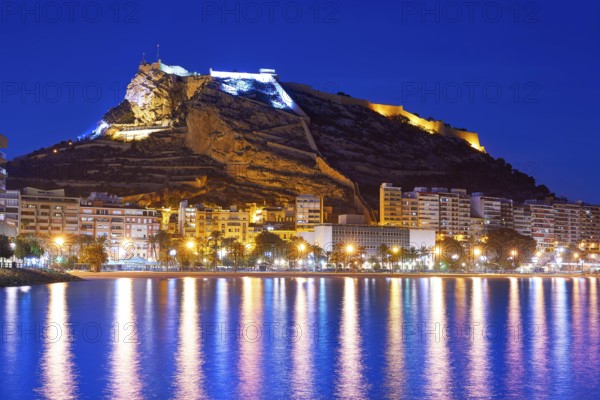 Alicante skyline at sunset from Postiguet beach in spain