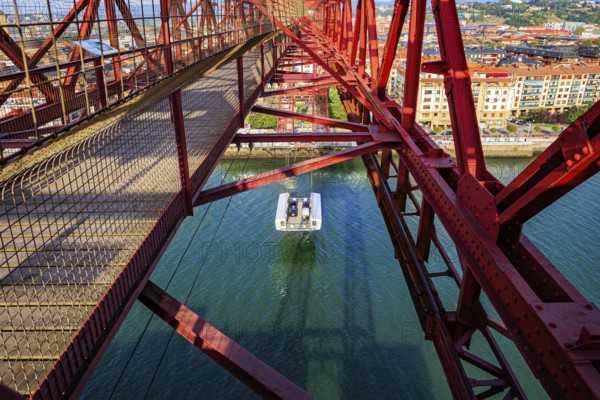 The gondola of Biscay Suspension Bridge in Portugalete. Bilbao, Basque country, Spain. Flying ferry across the Nervion River