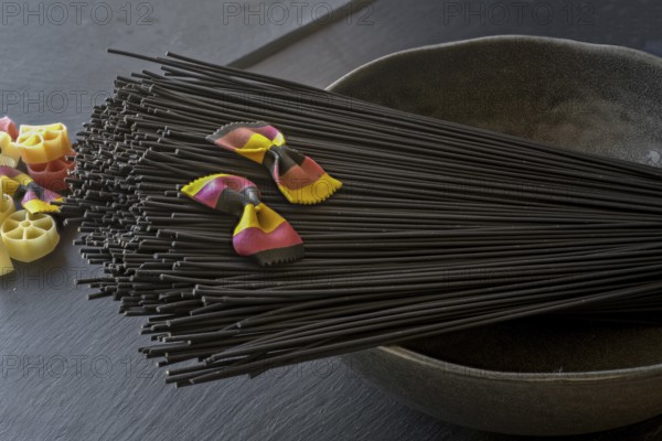 Black spaghetti and farfalle
