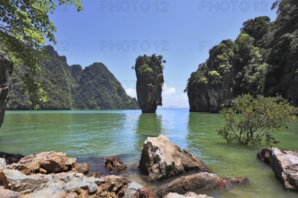 Fabulously beautiful landscape. Lovely island - rock in the shape of the vaseJames Bond. Closed lagoon into the ocean