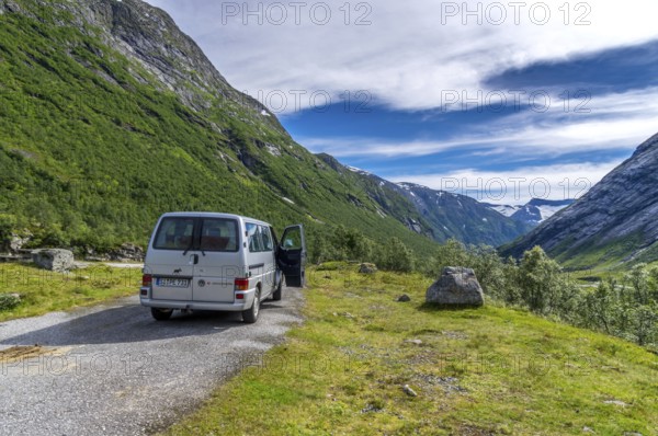 An idyllic valley in Strynefjell in Middle Norway in summertime with mountains and stream.A beautiful valley in the Middle of Norway in summertime