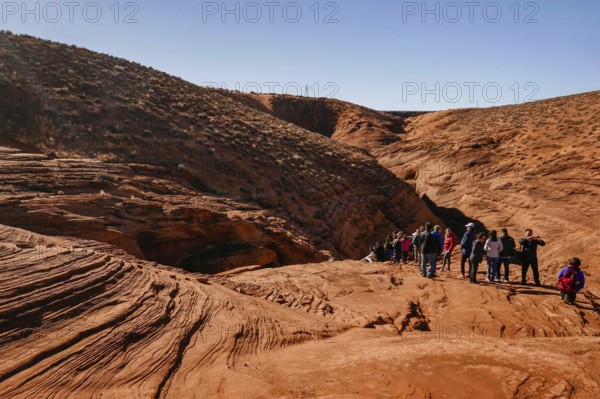 Antelope Canyon is a slot canyon in the American Southwest, on Navajo land east of Page, Arizona. the erosion of Navajo Sandstone 2 due to flash flooding and other sub-aerial processes