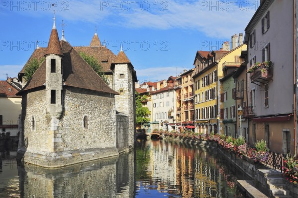 The picturesque medieval prison in the old French resort town of Annecy. Today it is a museum. The building looks great in the middle of a large city canal
