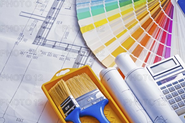 Set of painting tools paint brushes in tray rolls blueprints color palette calculator
