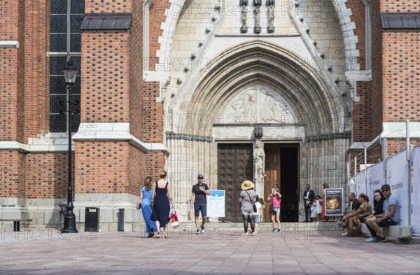 Uppsala, Uppland, Sweden, 07 27 2019 Entrance of the cathedral with a wedding, Europe