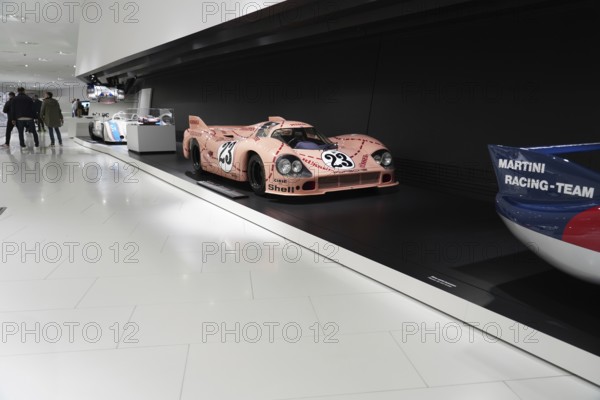 A pink Porsche 917 with a pig design on display in the museum, Neues Porschemuseum 2009, Stuttgart, Baden-Württemberg, Germany, Europe