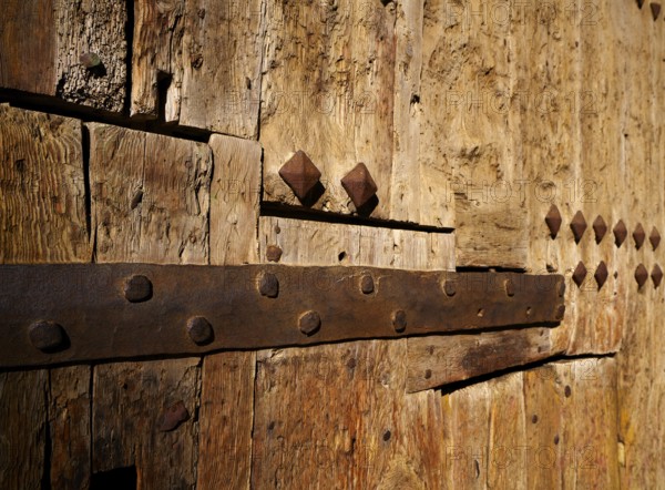 Ancient wooden door in Valencia Torres de Serranos at Spain