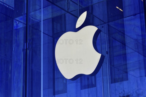 Manhattan, New York City, New York, USA, North America, Large Apple logo on a modern glass building with blue tint, United States of America, North America