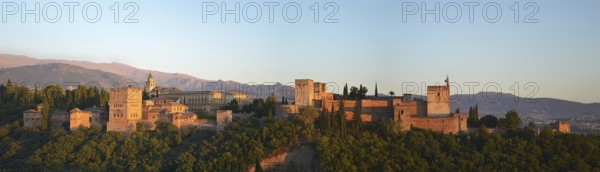 View of the Alhambra complex in Granada, Spain, at dusk, Europe