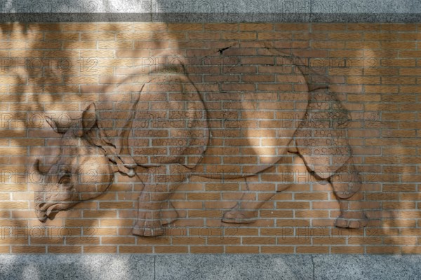 Berlin, Germany, 2014. Rhinoceros relief on the wall outside the zoo in Berlin, Europe