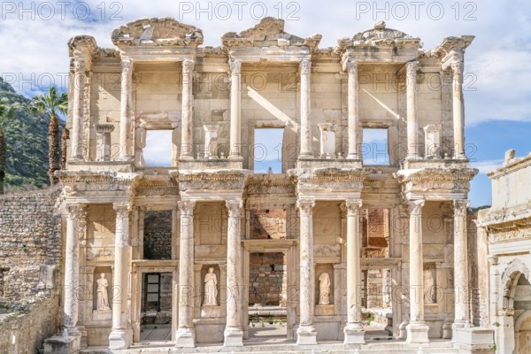 Celsus Library in Ephesus in Selcuk (Izmir), Turkey. Marble statue is Sophia, Goddess of Wisdom, at the Celcus Library at Ephesus, Turkey. The ruins of the ancient antique city