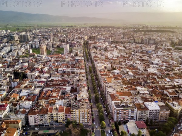 Aerial photograph of the capital of Aydin province - Aydin city from high point of drone fly in sunny day in Turkey. Amazing aerial cityscape view from birds fly altitude on beautiful city centre and parks