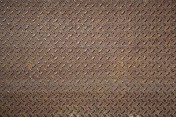 Front view of a rusty panel with non-slip surface