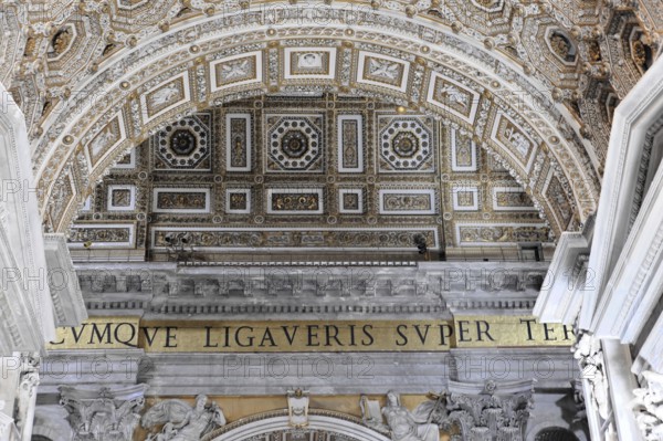St Peter's Basilica, Vatican, Rome, Lazio, Italy, Europe, Detailed ceiling decoration with lettering and ornate patterns, Europe