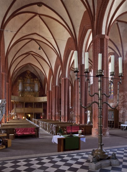 Werben Altmark Stadtkirche St Johannis 87732 Interior facing west 1412-67 built Standing chandelier 1487 by Hermen Bonstede Rotgießer from Hamburg