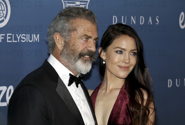 Mel Gibson and Rosalind Ross at the Art Of Elysium's 12th Annual Heaven Celebration held at the Private Venue in Los Angeles, USA on January 5, 2019., Los Angeles, California, USA, North America